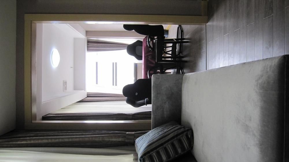 Sheng Jing Yi Jia Hotel Huji Exteriör bild